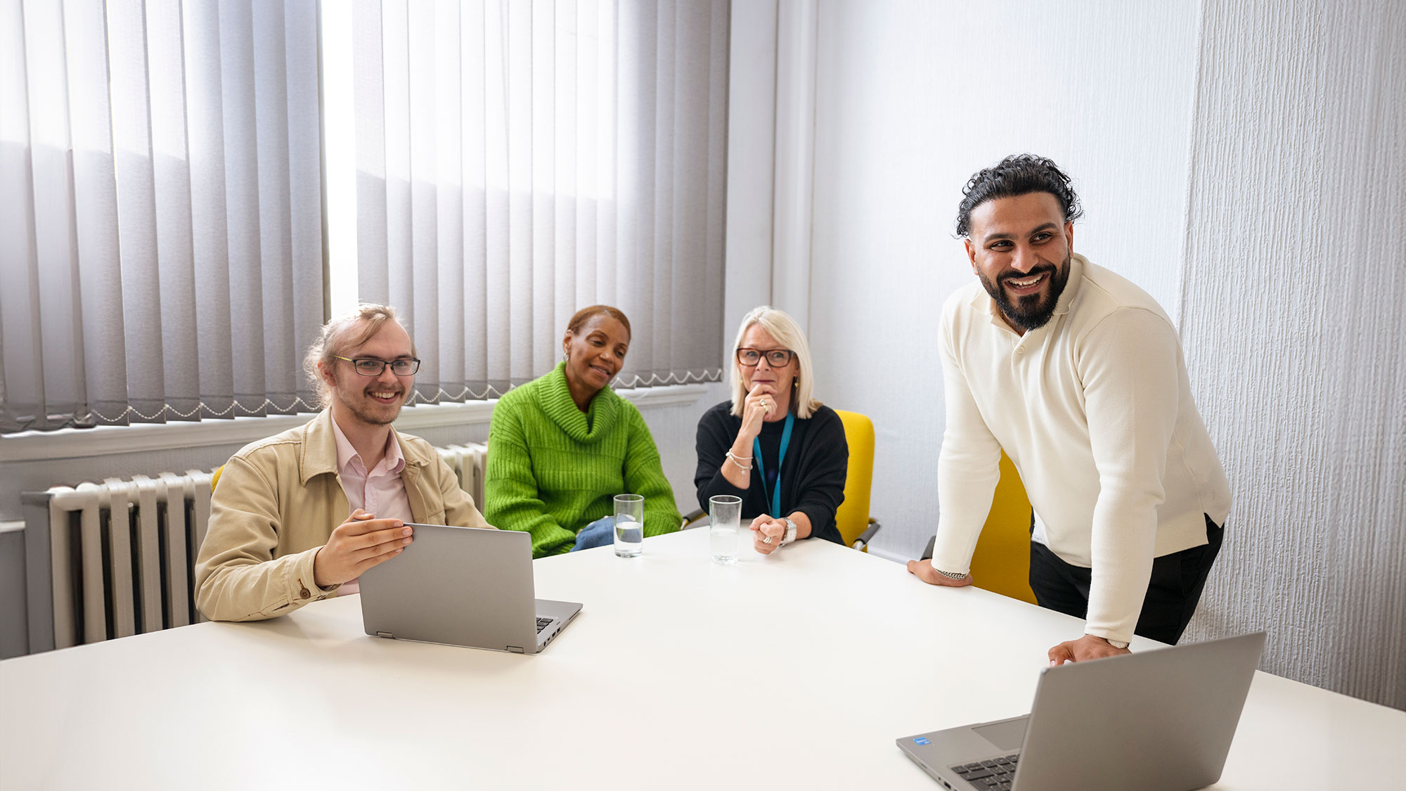 Group of employees at a desk